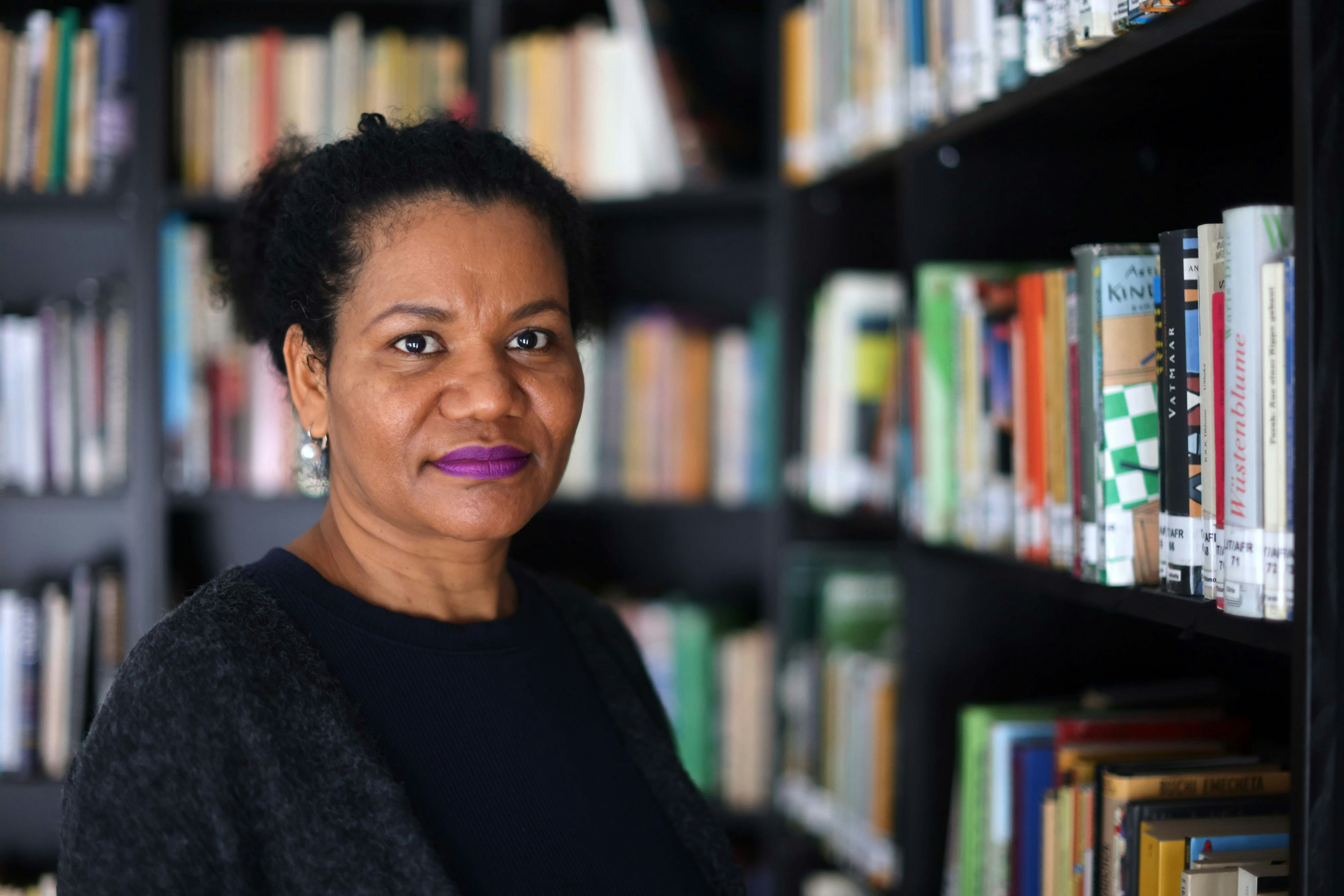 Glenda Obermuller in the library